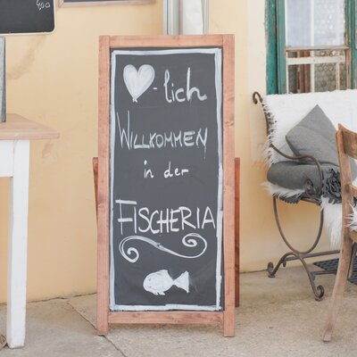 Tafel vor der Fischeria fuer den Eingang | © Daniel Gollner 