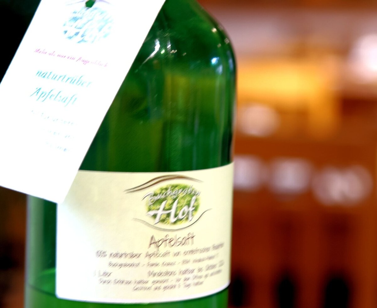 Bottle of natural cloudy apple juice from the farmhouse.