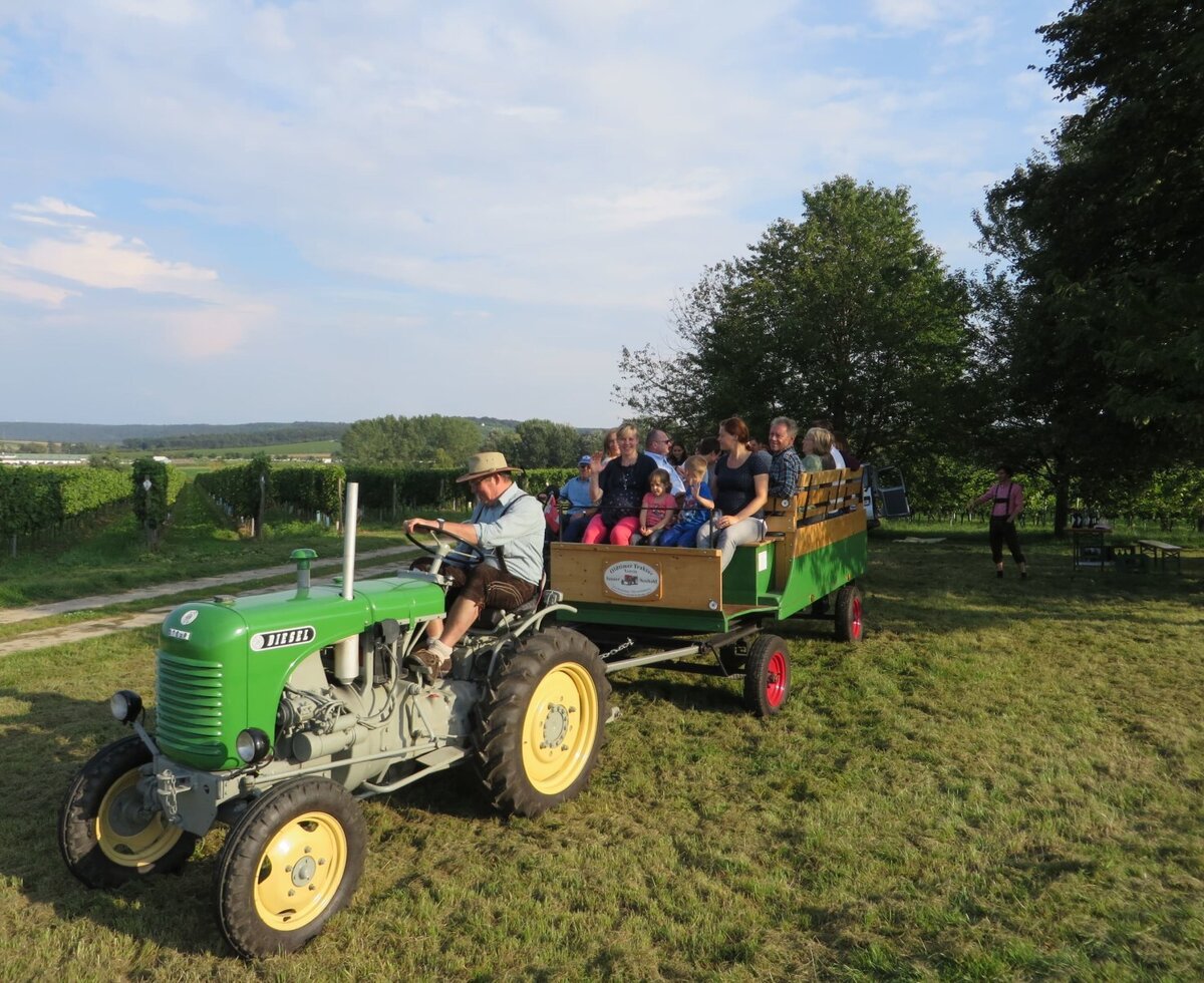 A tractor-pulled wagon ride for guests through the vineyards at the farmhouse.