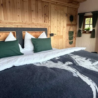 The Panorama Room combines a comfortable double bed with the warm, natural character of its Swiss stone pine panelling.
