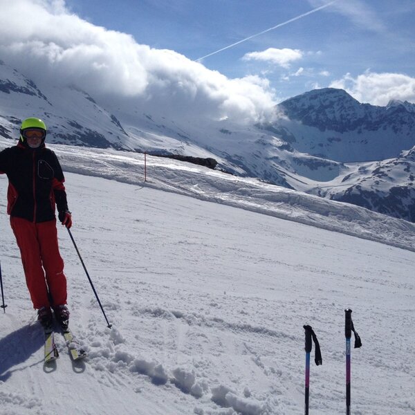 Skiing on the snow-covered mountains, an activity accessible from the farmhouse.