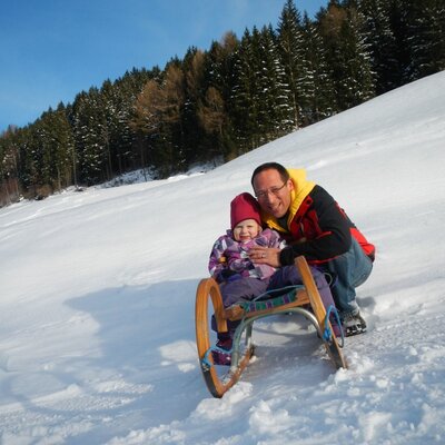 Ida and Alex sledding