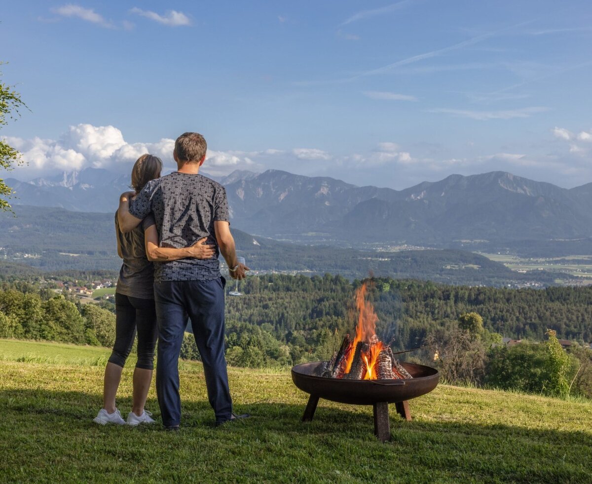 The outdoor fire pit of the farmhouse with panoramic views of the mountains and valley.