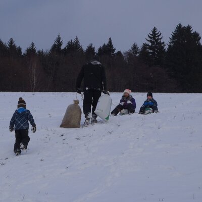Winter fun sack sliding