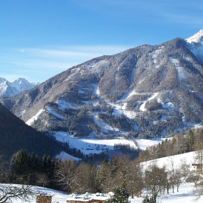 View of snow-covered mountains and valleys from the Farm House.