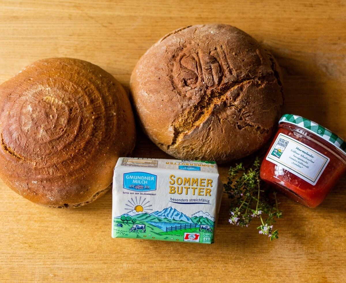Fresh bread, butter, and jam, available at the farmhouse.
