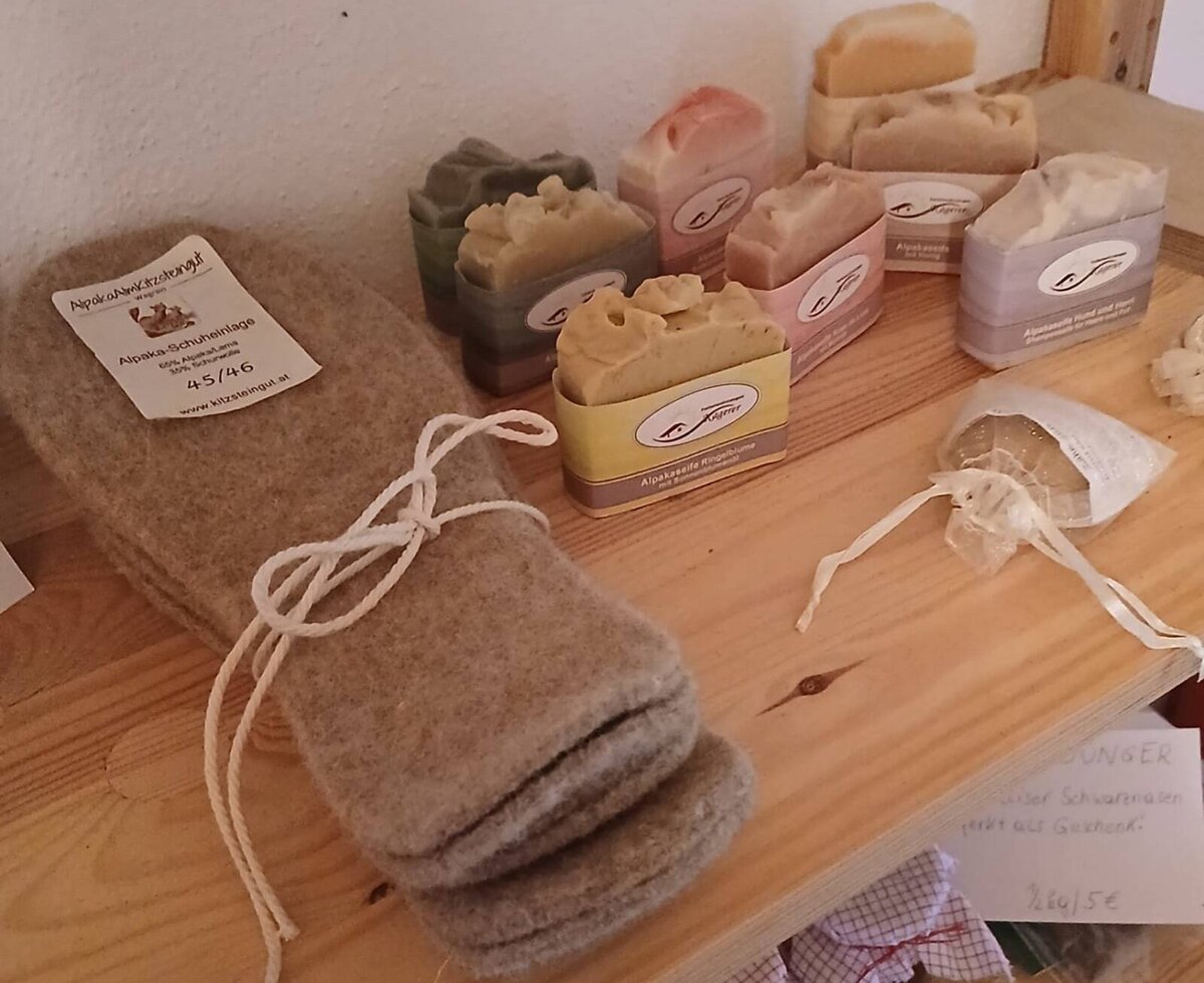 Alpaca shoe insoles and various alpaca soaps, available at the farmhouse.