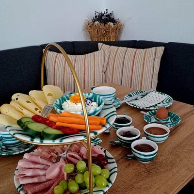 A rich and lovingly prepared breakfast served on the cozy dining corner.