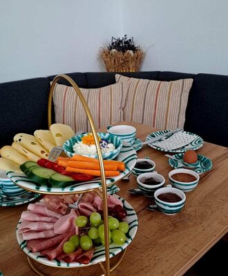 A rich and lovingly prepared breakfast served on the cozy dining corner.