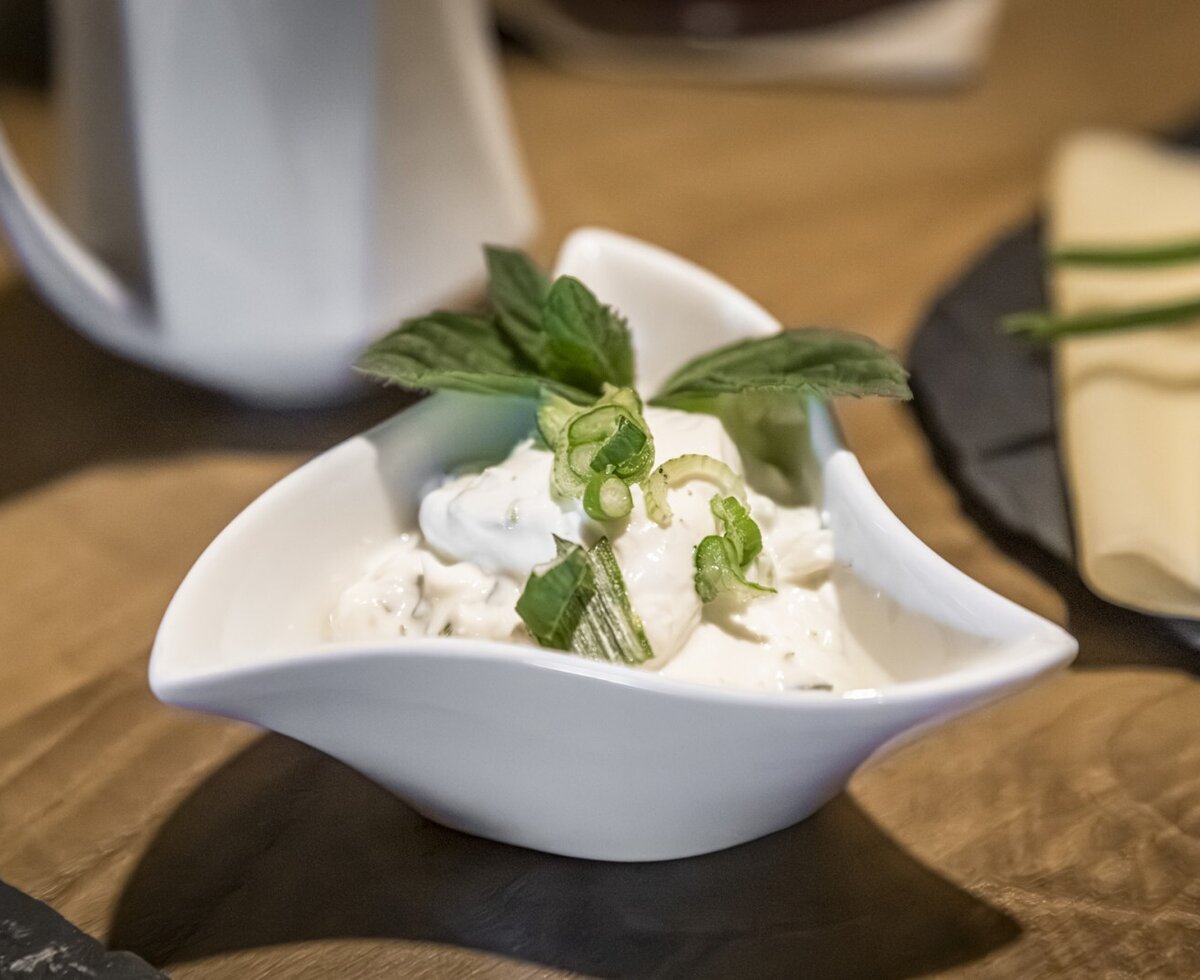 Creamy dip with mint and chives, served as part of the farmhouse breakfast.