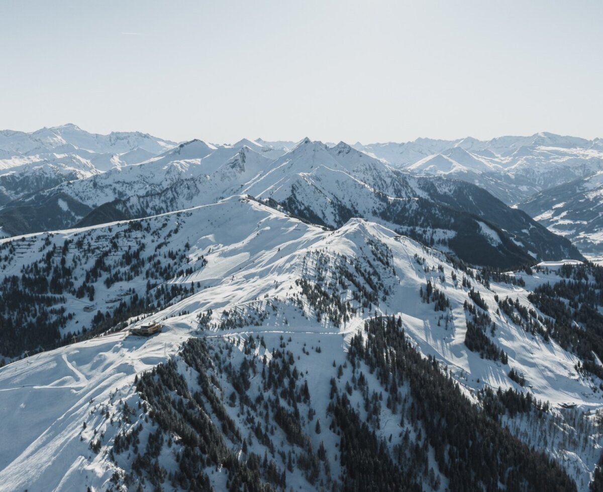 View of the snow-covered mountains and ski slopes of the Gastein Alps