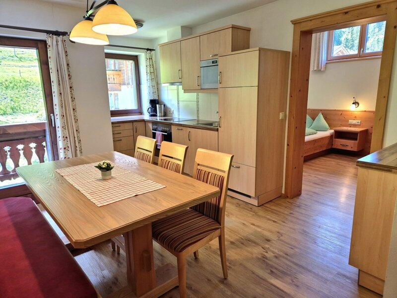 fully equipped eat-in kitchen apartment forest view