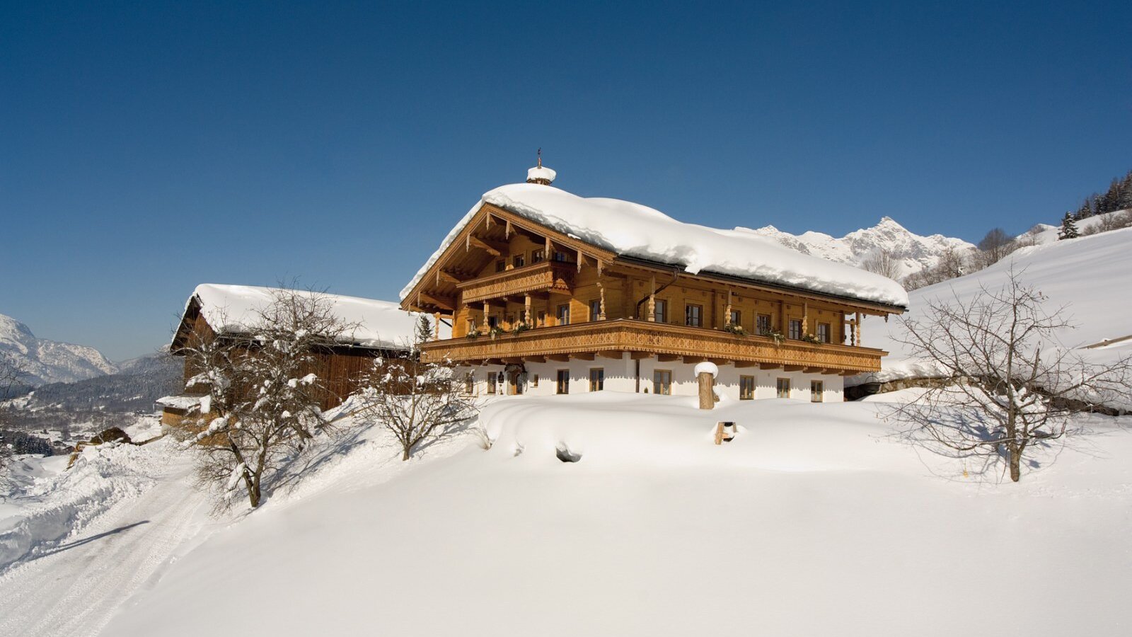 Our farm, built in the traditional wooden style...