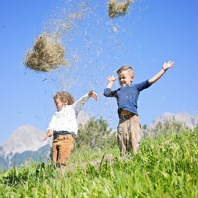 Children are allowed to help with the haymaking.