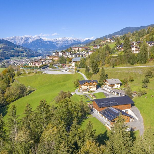 Farm scene with mountain panorama