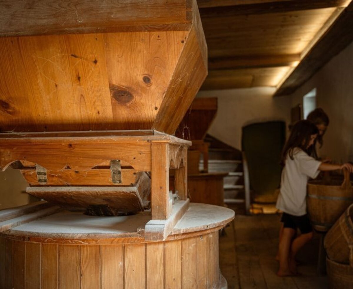 The historic mill at the organic farm, where homemade organic black bread is ground.