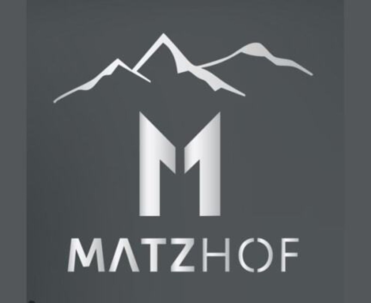The modern logo of the Matzhof farmhouse, featuring stylized mountain peaks.