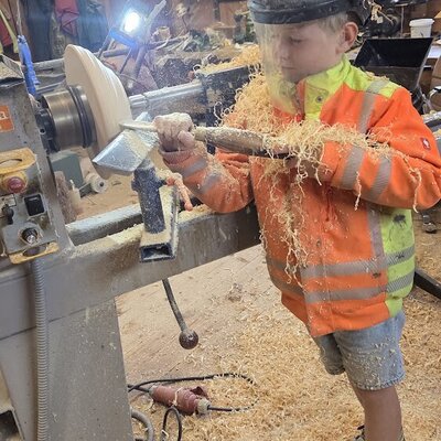 An exciting glimpse into traditional woodcraft in the farmhouse's rustic workshop.