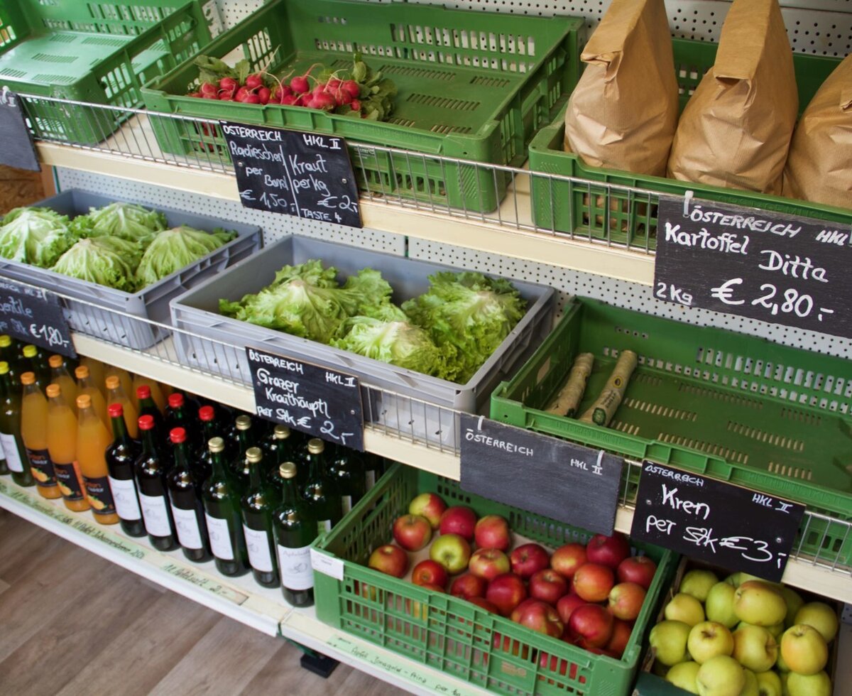 The farm shop at the farmhouse, offering fresh vegetables, fruit, and drinks for purchase.