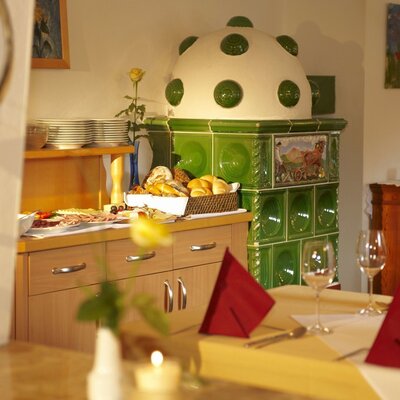 Pub room with tiled stove