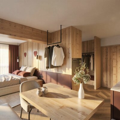 Farmhouse room with a double bed, dining table, and kitchenette, furnished with solid wood furniture.