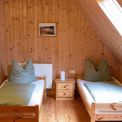 single beds in forrest-view room