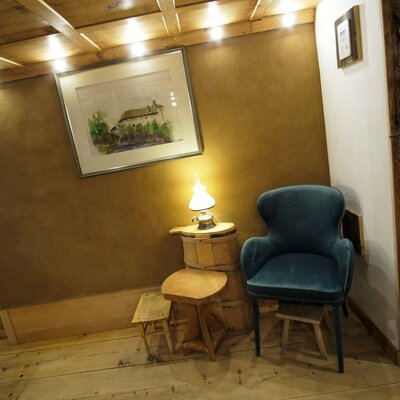 Reading corner by the clay oven