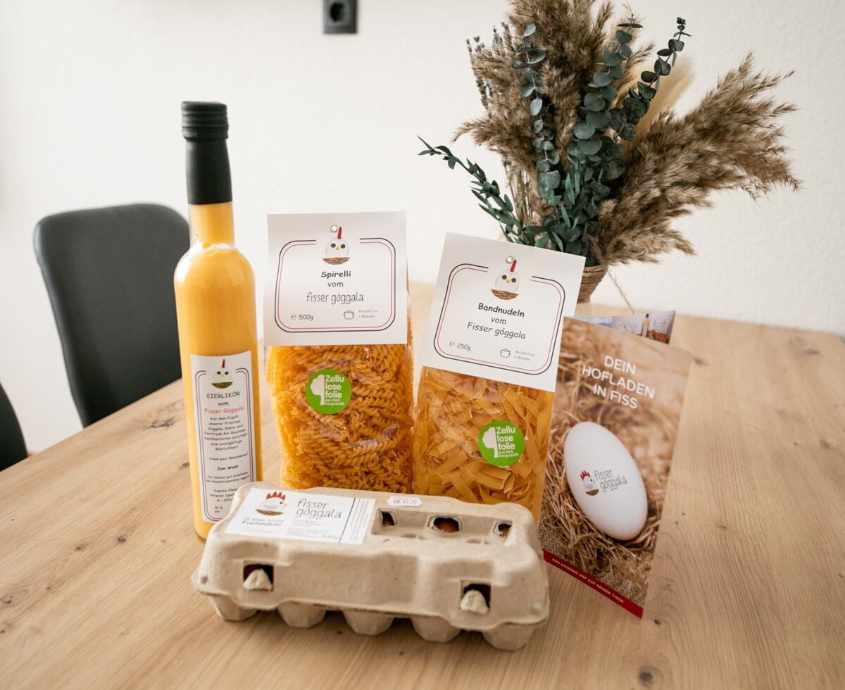 Welcome gift with local products such as egg liqueur, pasta, and fresh eggs in the apartment.