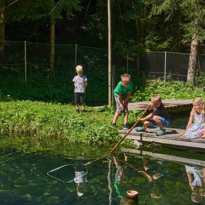 Fishing at the fish pond