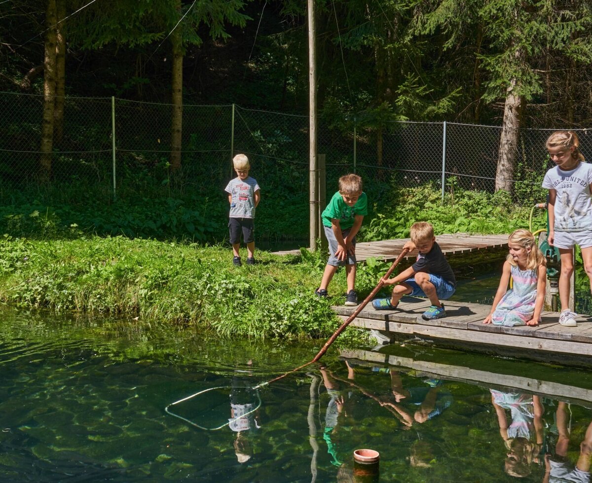 Fishing at the fish pond