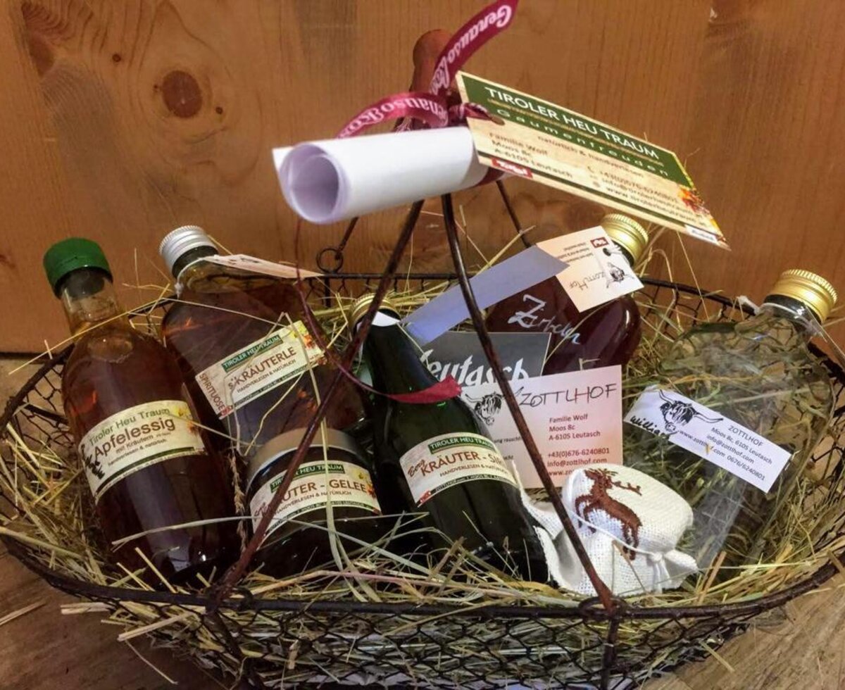 A thoughtfully prepared gift basket from the apartment, filled with local Tyrolean specialties bedded on hay.