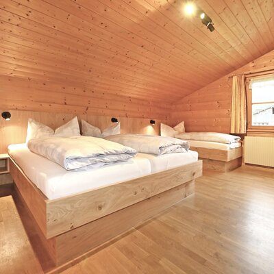 Here you can see the bedroom - made entirely of wood.